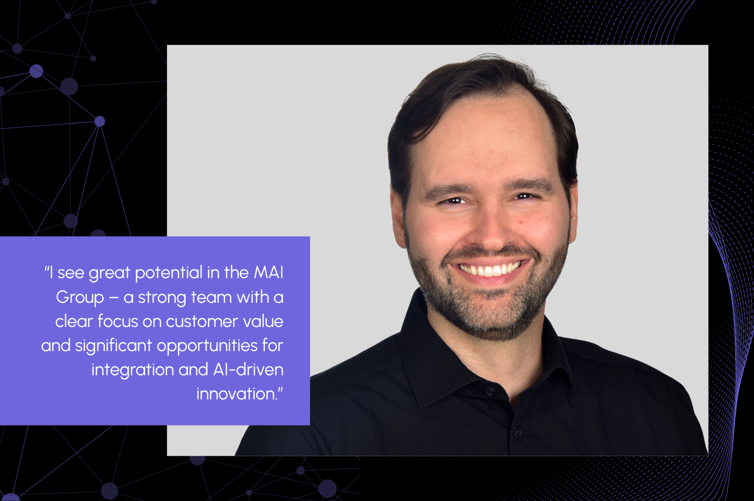 Portrait photo of Philipp Hannemann, the new CEO of MAI Group, smiling with dark hair and a beard, wearing a black shirt, in front of a gray background. On the left, a quote on a purple background reads: “I see great potential in the MAI Group – a strong team with a clear focus on customer value and significant potential for integration and AI innovation.”